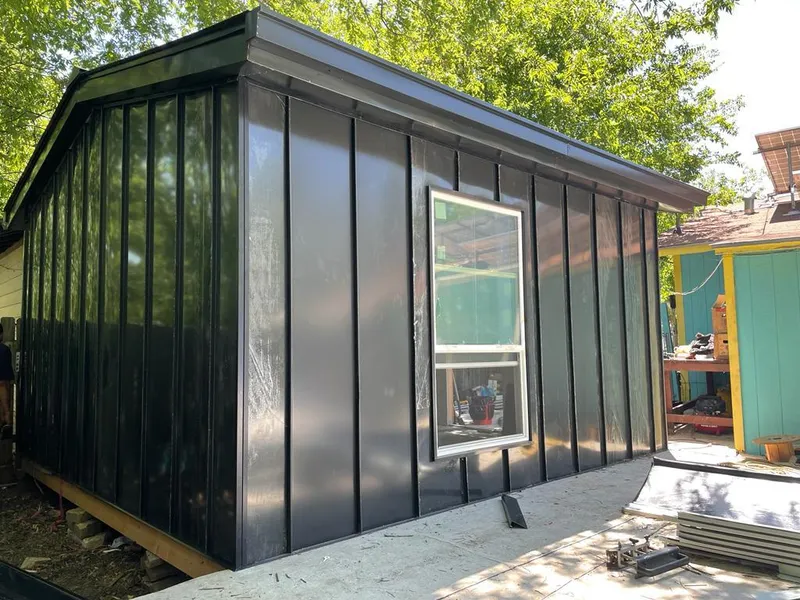 Black standing seam metal wall panels for Roof Inspection in Baker City